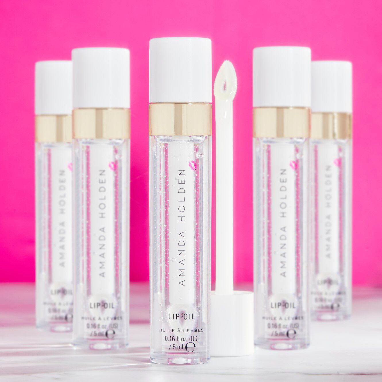 REVOLUTION PRO X AMANDA HOLDEN DIAMOND KISS LIP OIL CLEAR